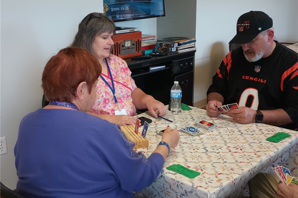 People playing Uno